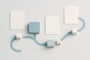 Clean white desk with a laptop showing abstract local map pins and minimalist analytics charts, next to a notebook and smartphone on a cool white workspace.
